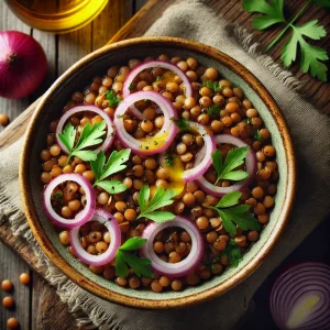 Warme linzensalade met rode ui en olijfolie